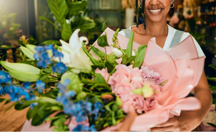 bouquet of flowers and happy woman