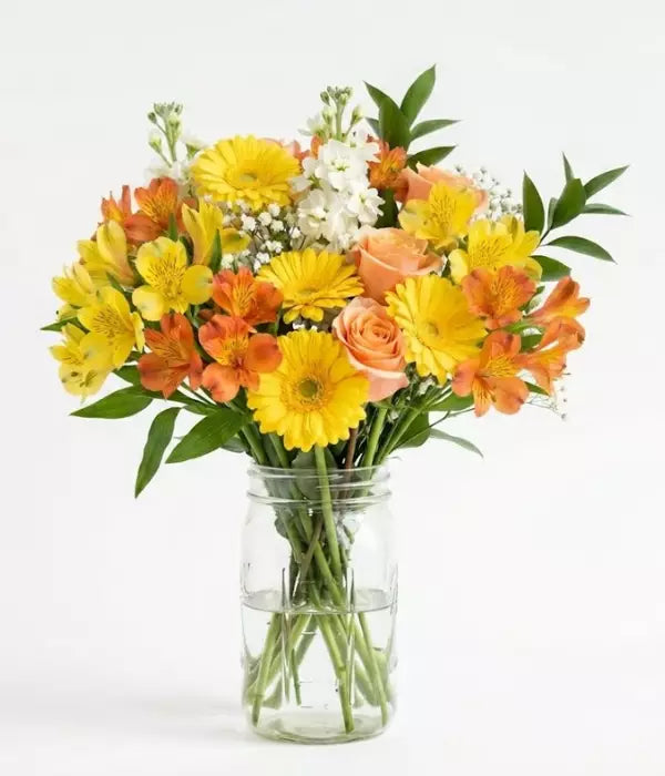 Bright mason jar flower arrangement for casual gifting